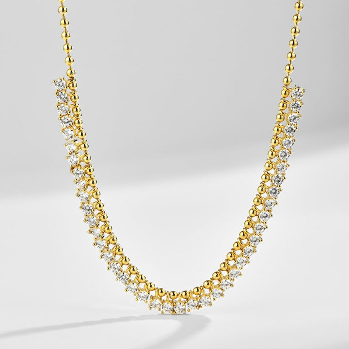 Collana pallina con punti luce