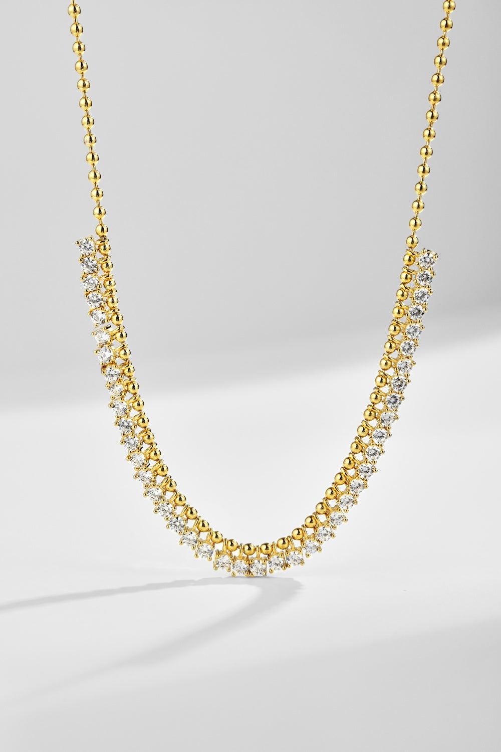 Collana pallina con punti luce